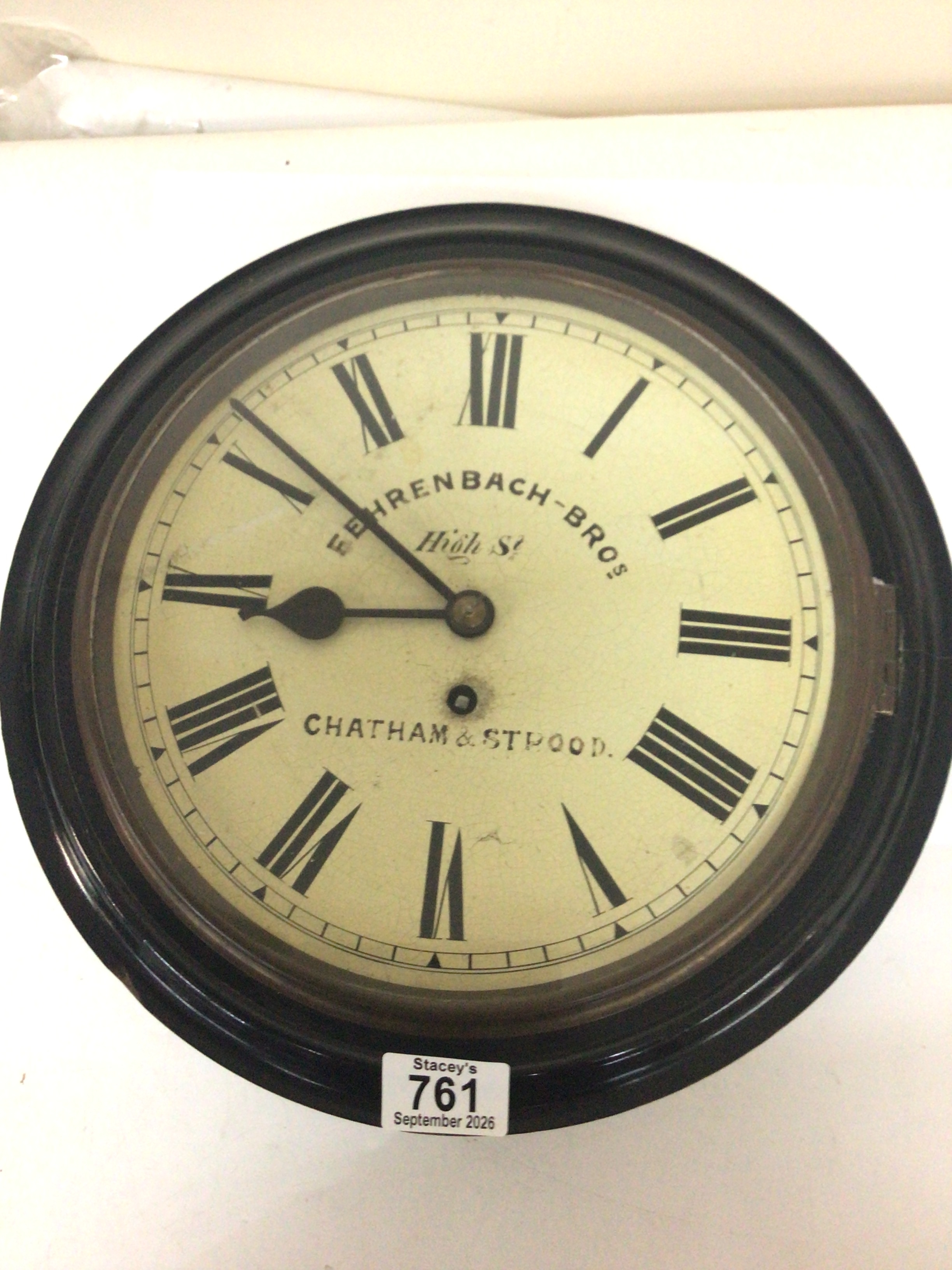  A late Victorian single fusee wall clock the dial with the inscription Eehrenbach-Bros  Chatham & Strood. In an ebonized case Diameter  33cm with pendulum.   