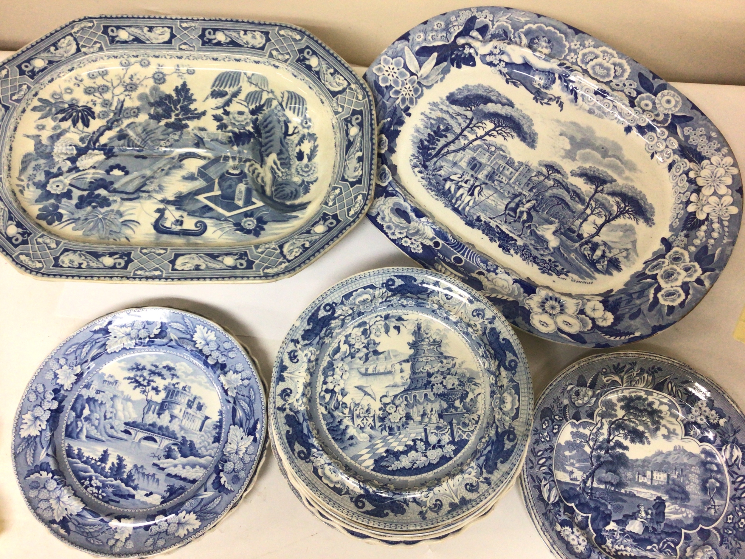  Two large decorative Victorian meat plates and a quantity of other well decorated Victorian blue and white plates. 