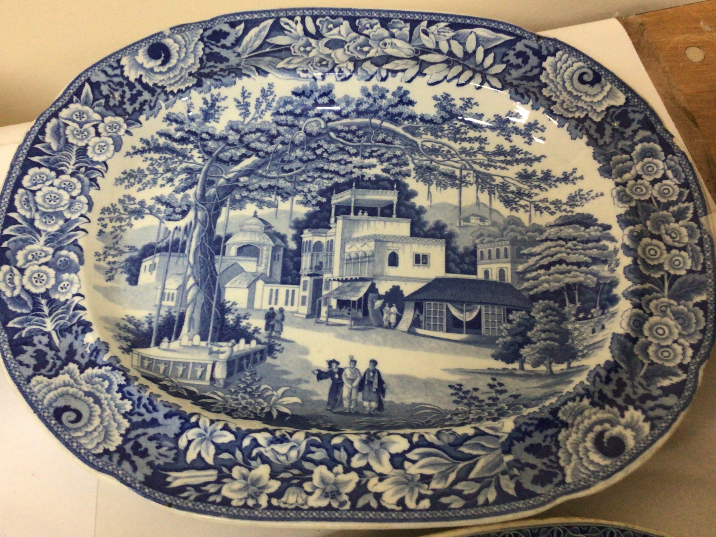  A collection of Mid Victorian and earlier British ceramic blue and white meat plates full decoration with landscape views including a pair of meat plates with riders on Zebra sudo Chinese views. all in good condition in keeping with age. 