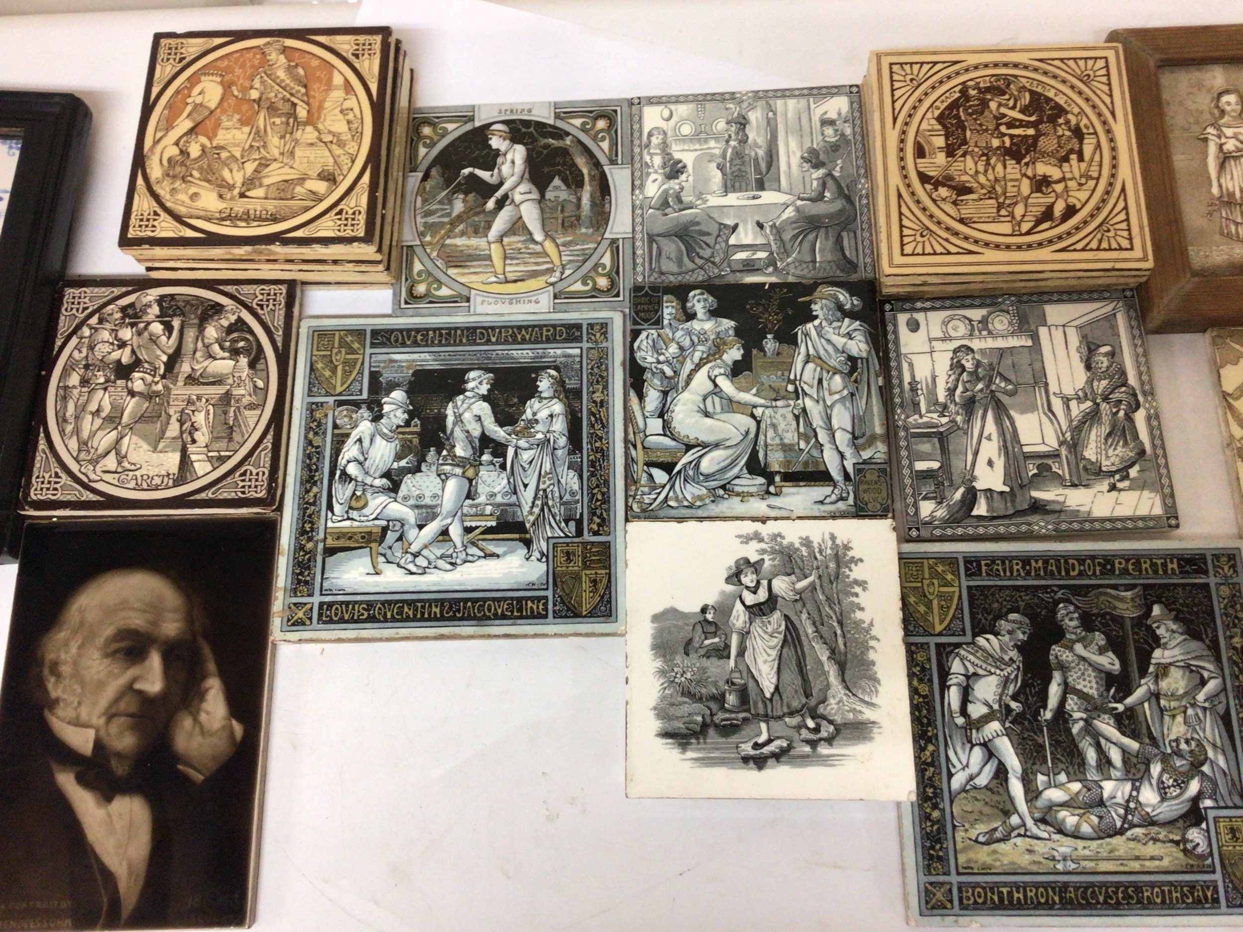  A collection of Victorian ceramic tiles including Pre-Raphaelite inspired tiles and a portrait tile after original photograph by of H S Mendelssohn The reverse with makers details and other makers including Minton all good condition in keeping with age. 