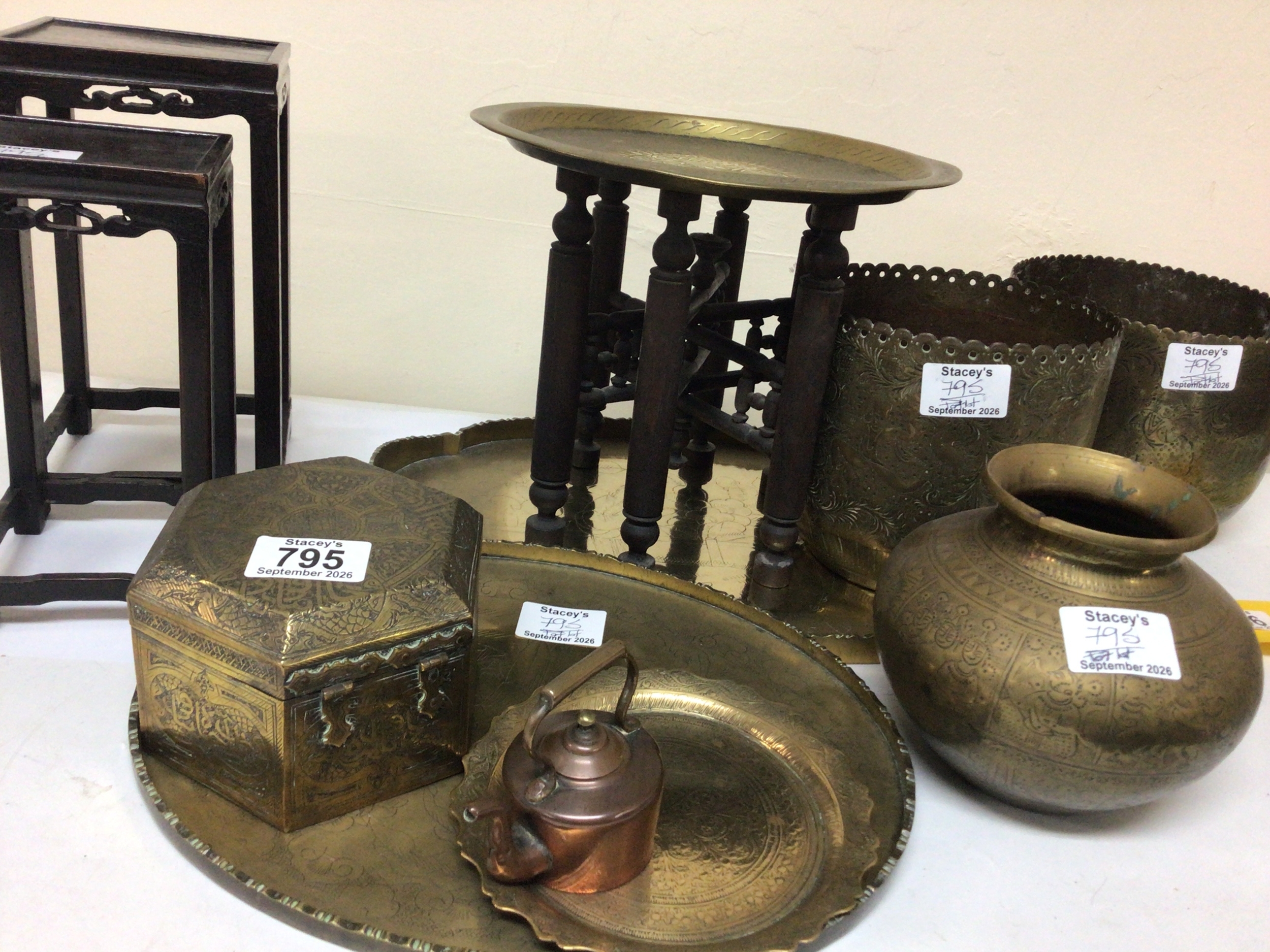  A collection of Chinese and Middle Eastern brassware and two graduating Chinese stands maximum height 23cm 