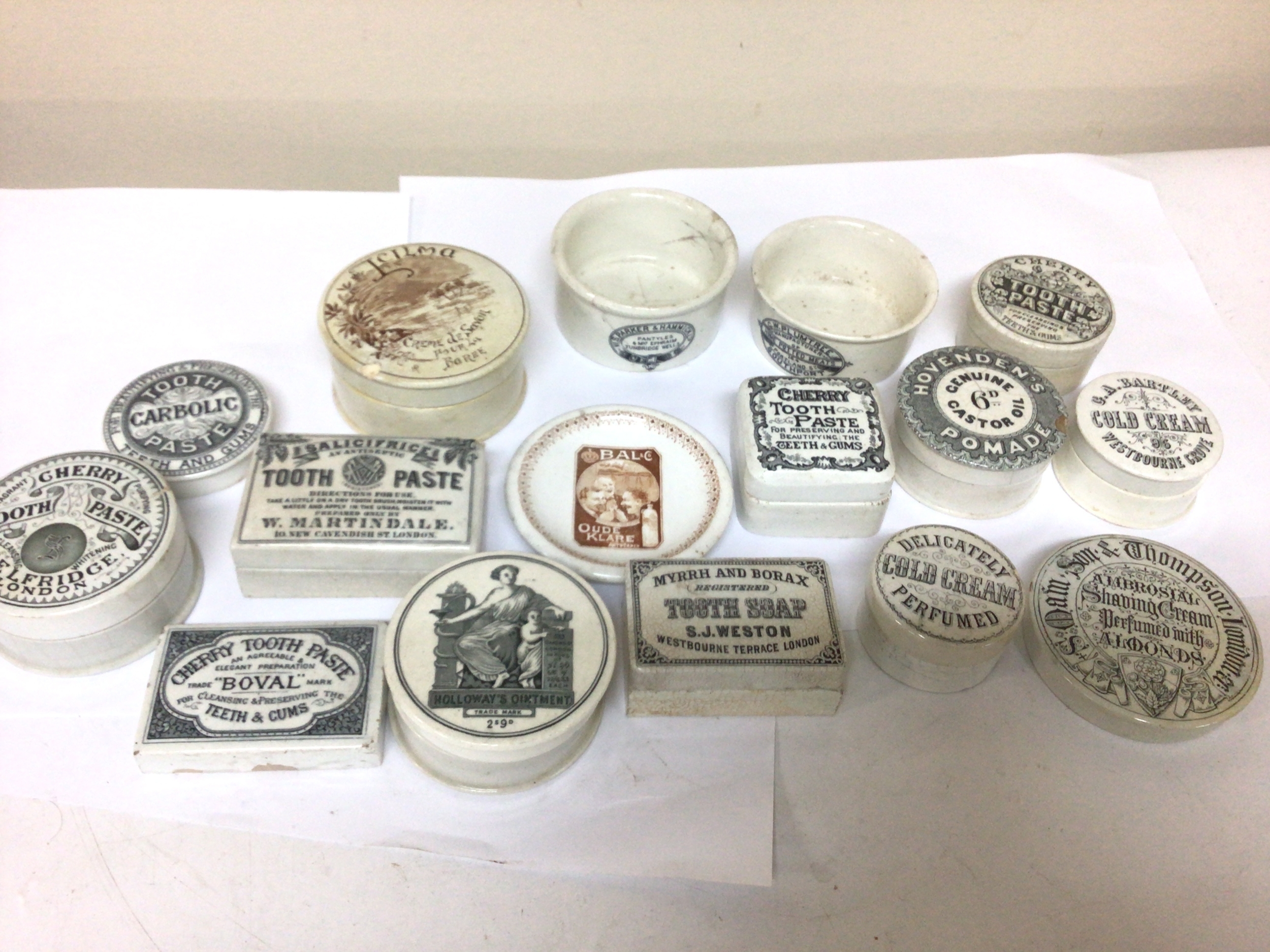   A collection of Victorian ceramic Tooth paste Holloways Ointment and cold cream jars 