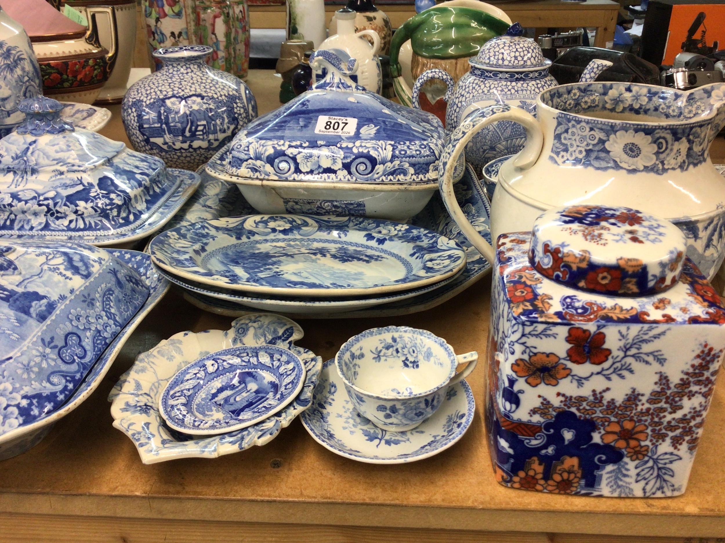 A Collection of Victorian Blue and white ceramics plates jugs all with full decoration landscape views and other ceramics.