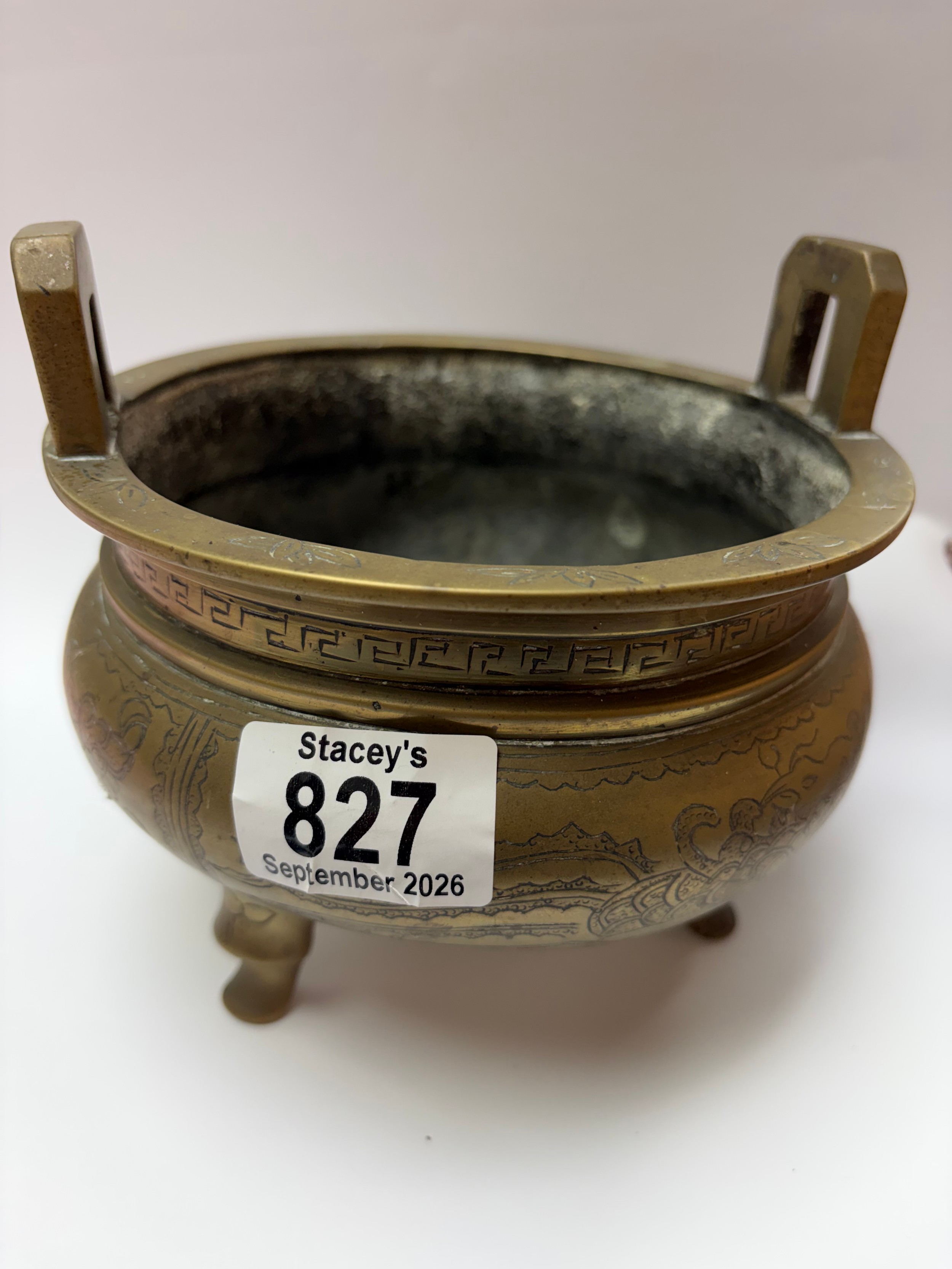 A Chinese brass censer with caricature marks to the base. Diameter 15cm