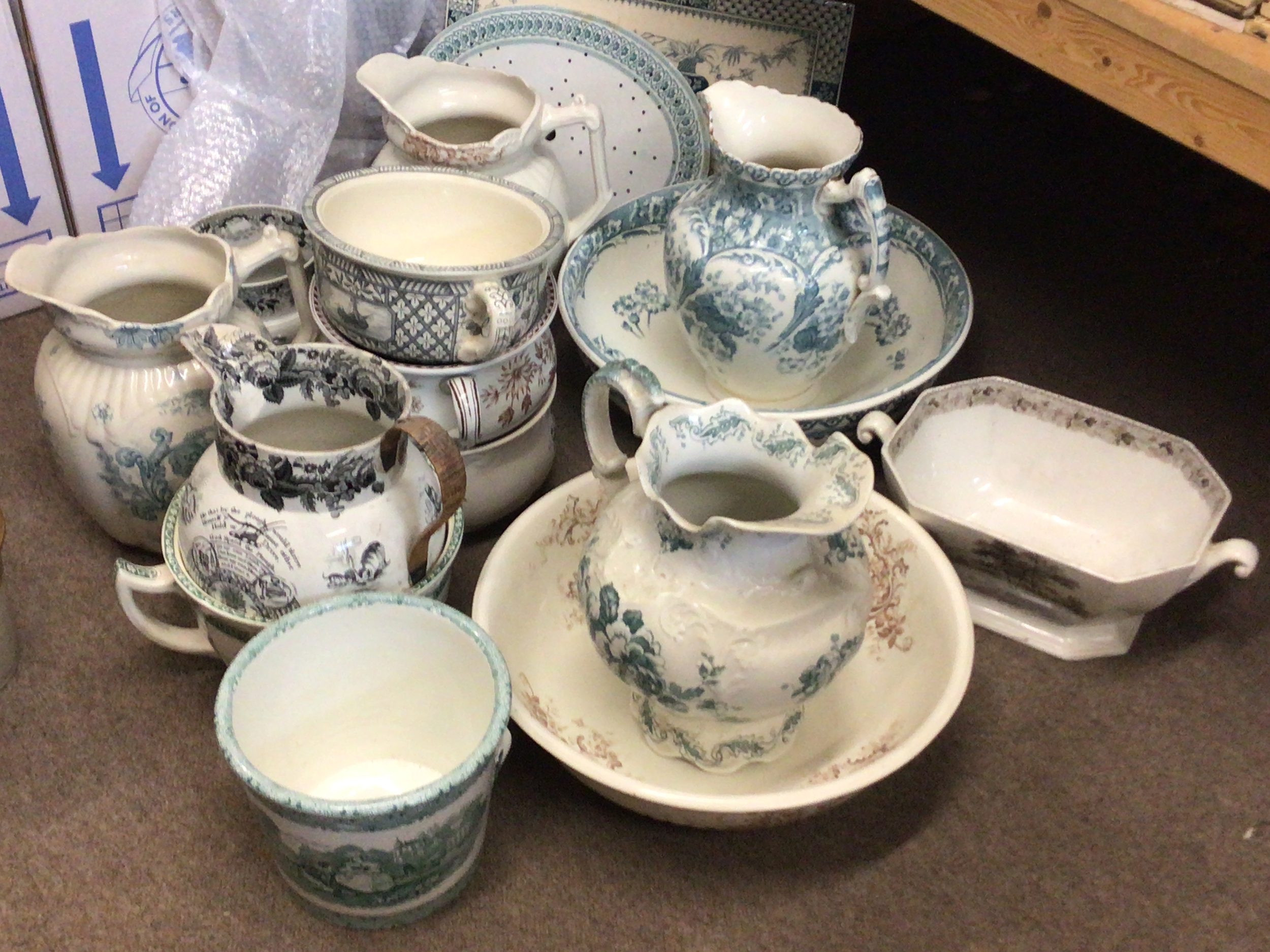 A Collection of Victorian chamber pots washing bowls and jugs and other conforming ceramics. 