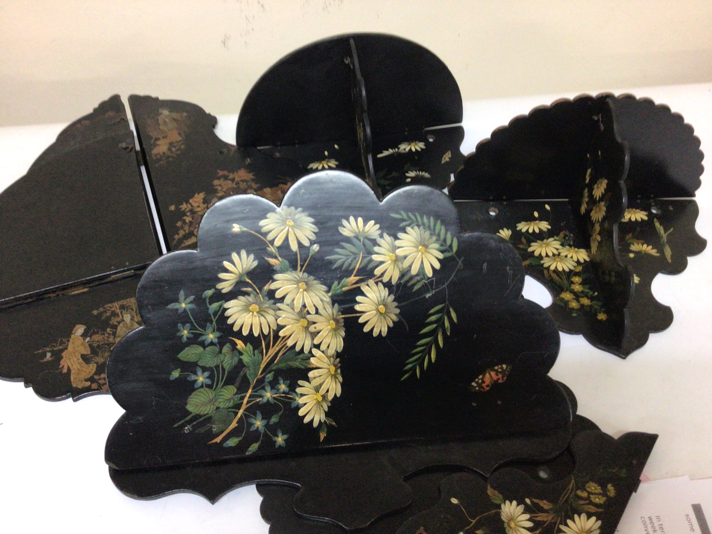  A Collection of lacquered papier-mâché Victorian folding corner open display shelf's. hand painted with flowers and with chinoiserie decoration. 