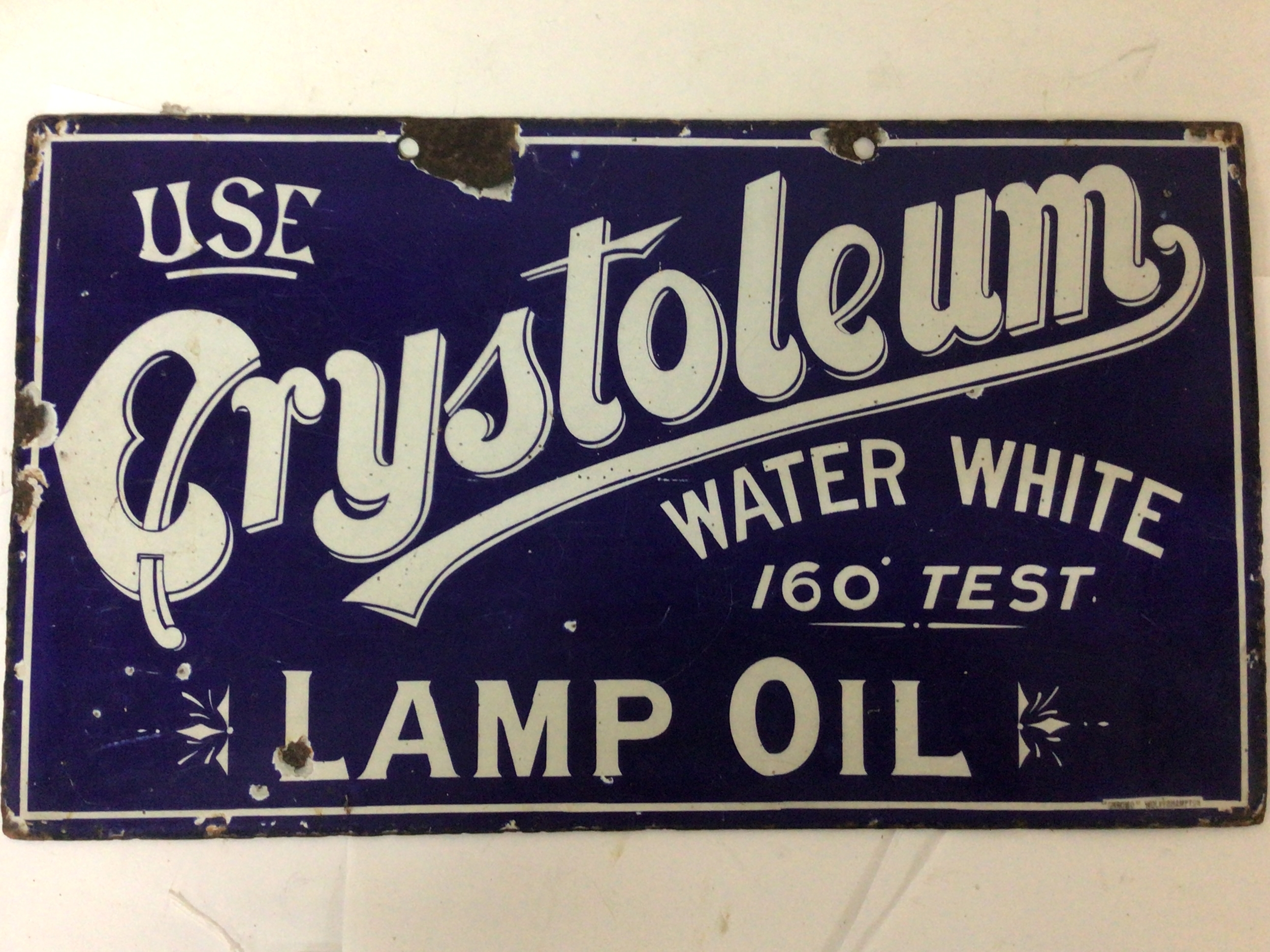  A Vintage enamel sign Use Crystoleum water white Lamp oil. 48x28cm