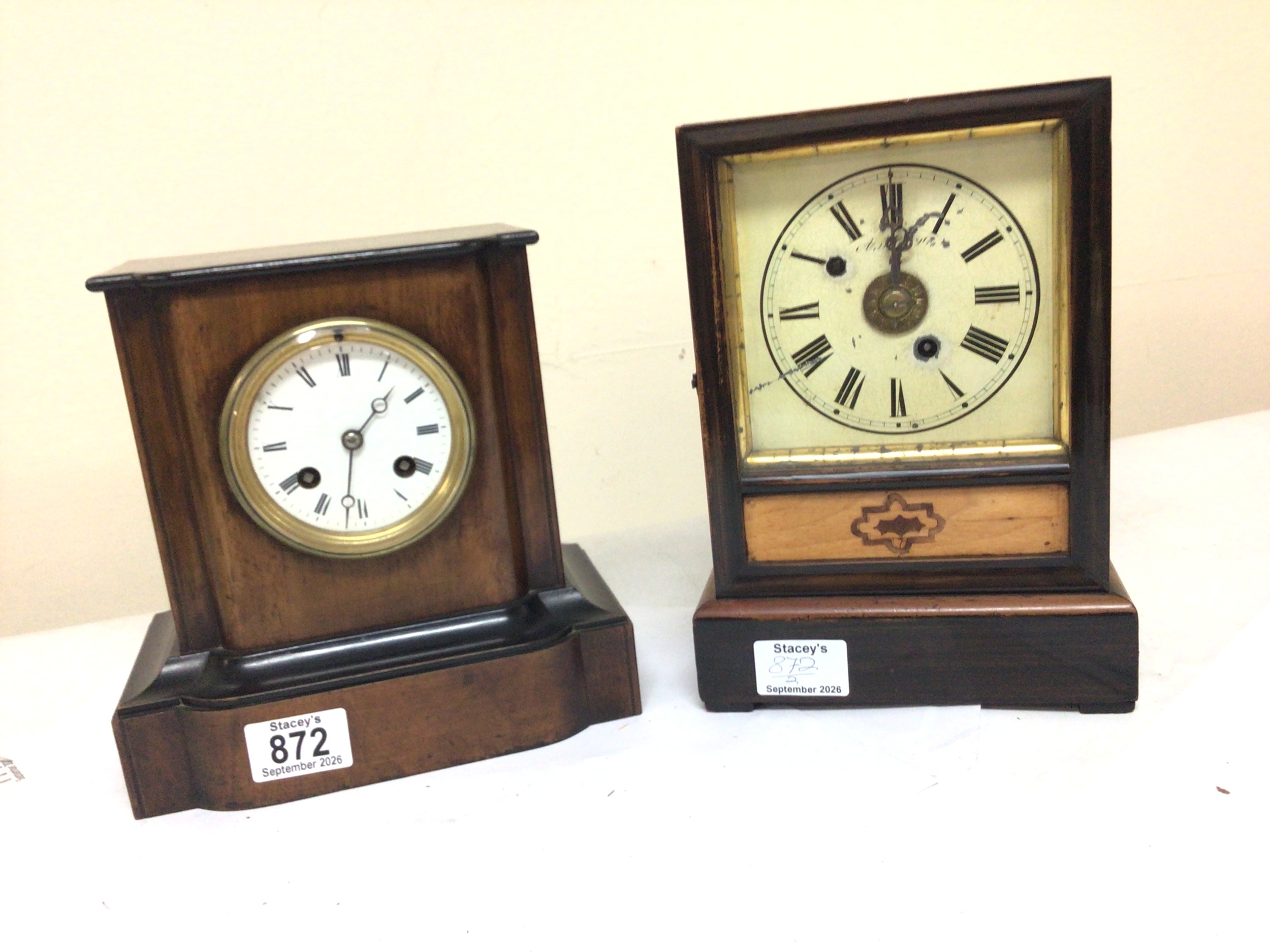  A small Victorian walnut mantle clock and one other mantel clock possibly American (2) 