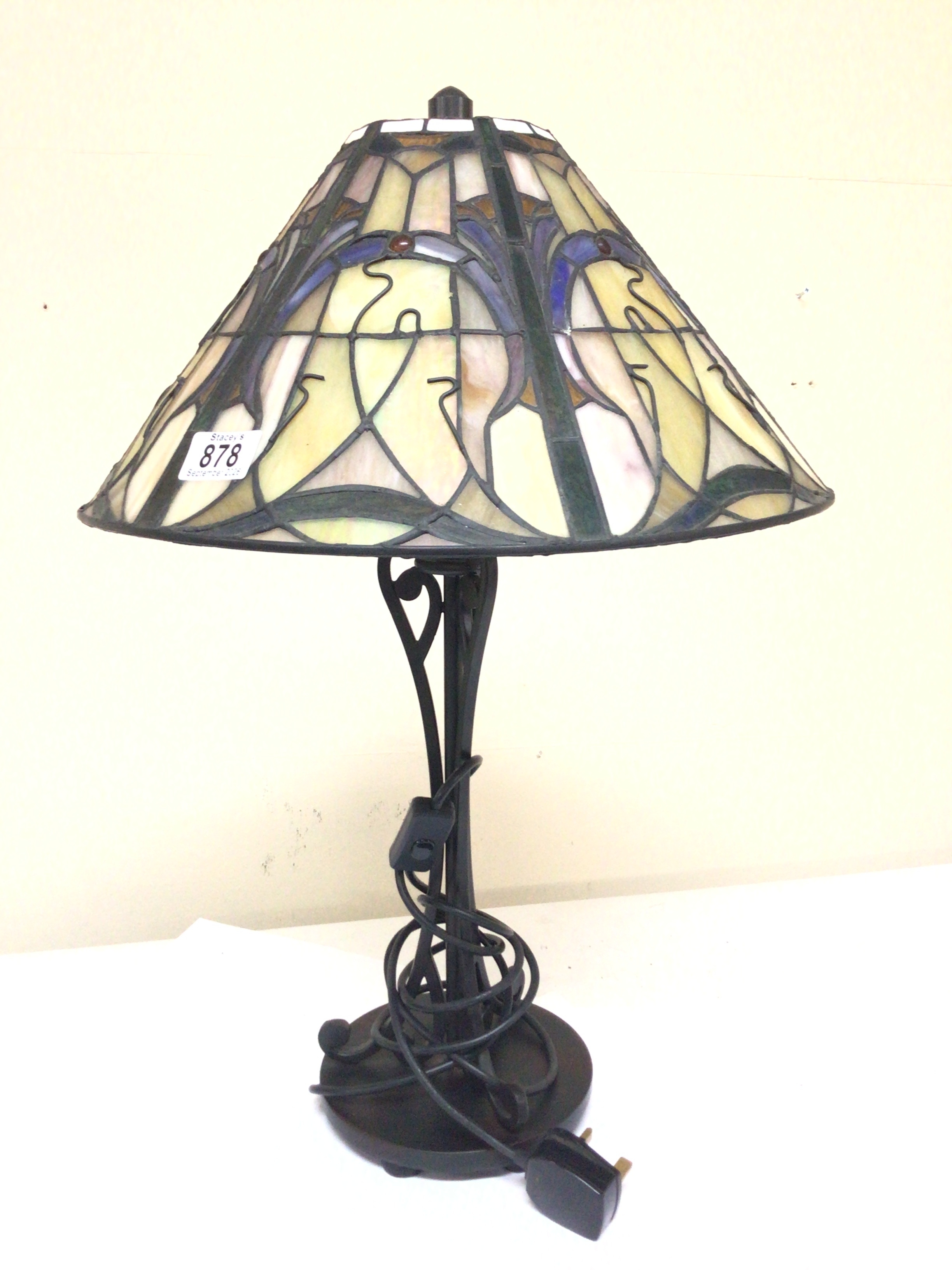  A good quality Tiffany Style lamp fitted for electric. Height 63cm