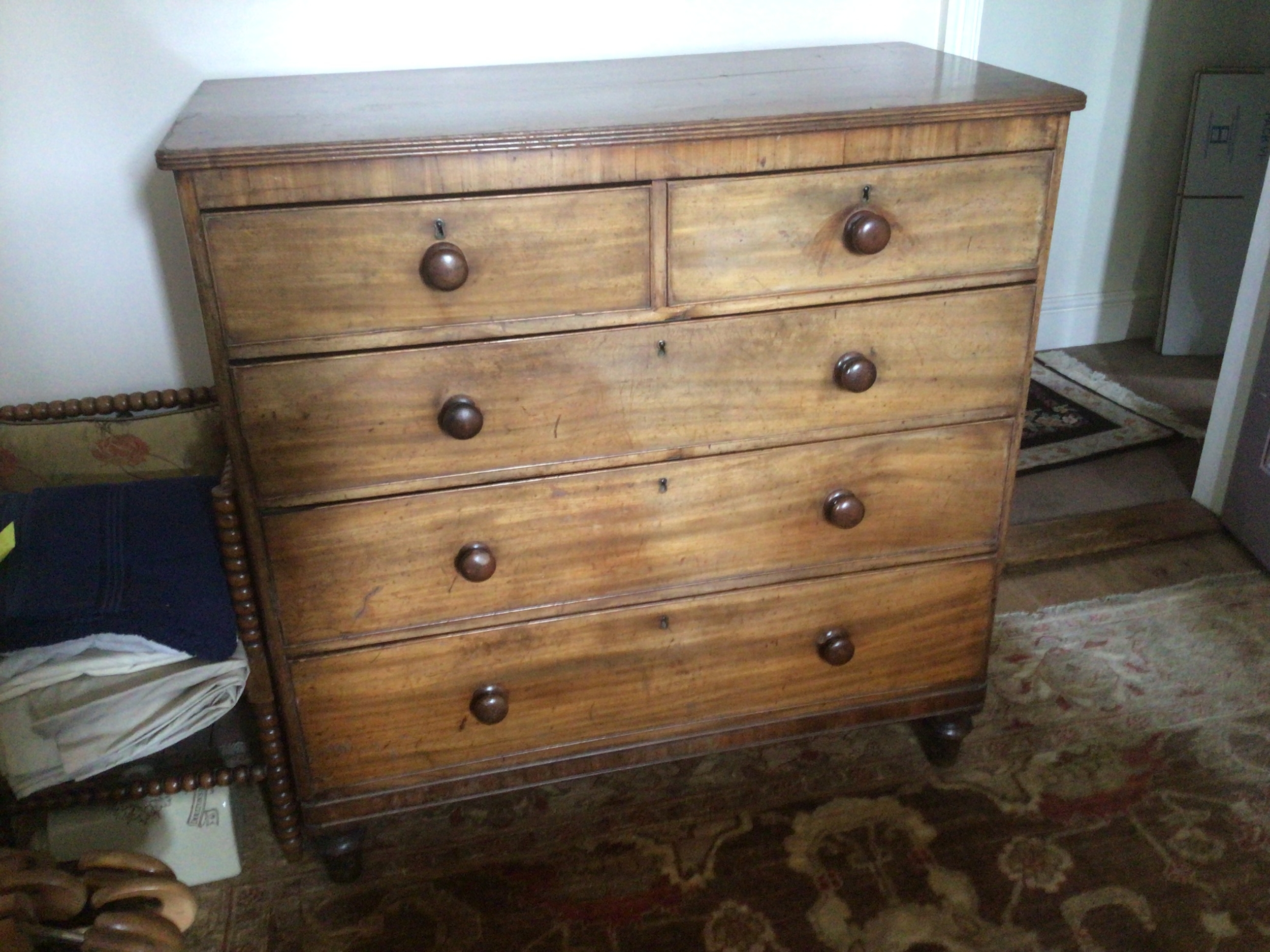 An Early Victorian mahogany chest of drawers with two short and three long drawers 109cm wide. 