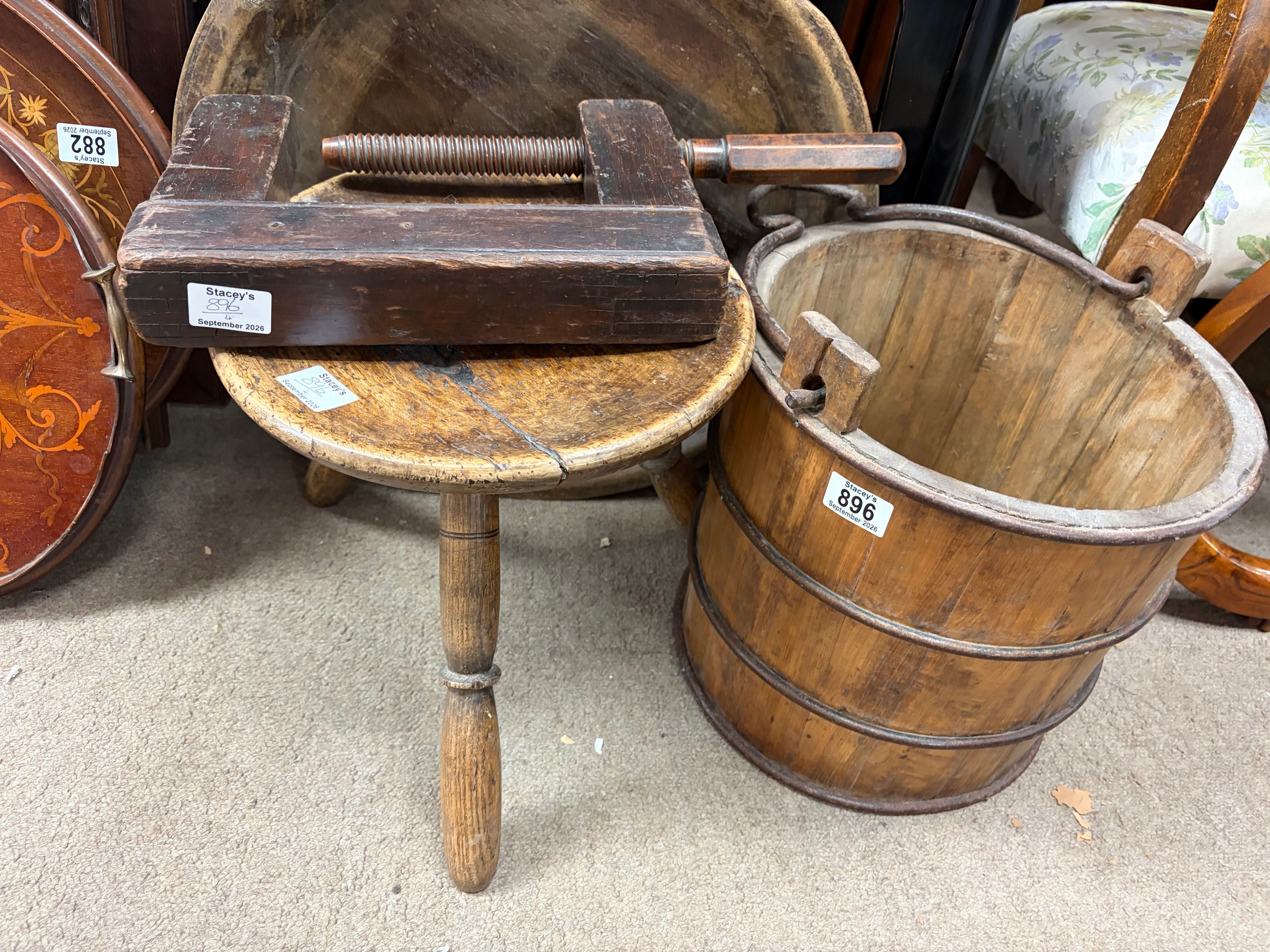 A collection of 19th century Vernacular items a bucket wooden book clamp stool and tray (4)