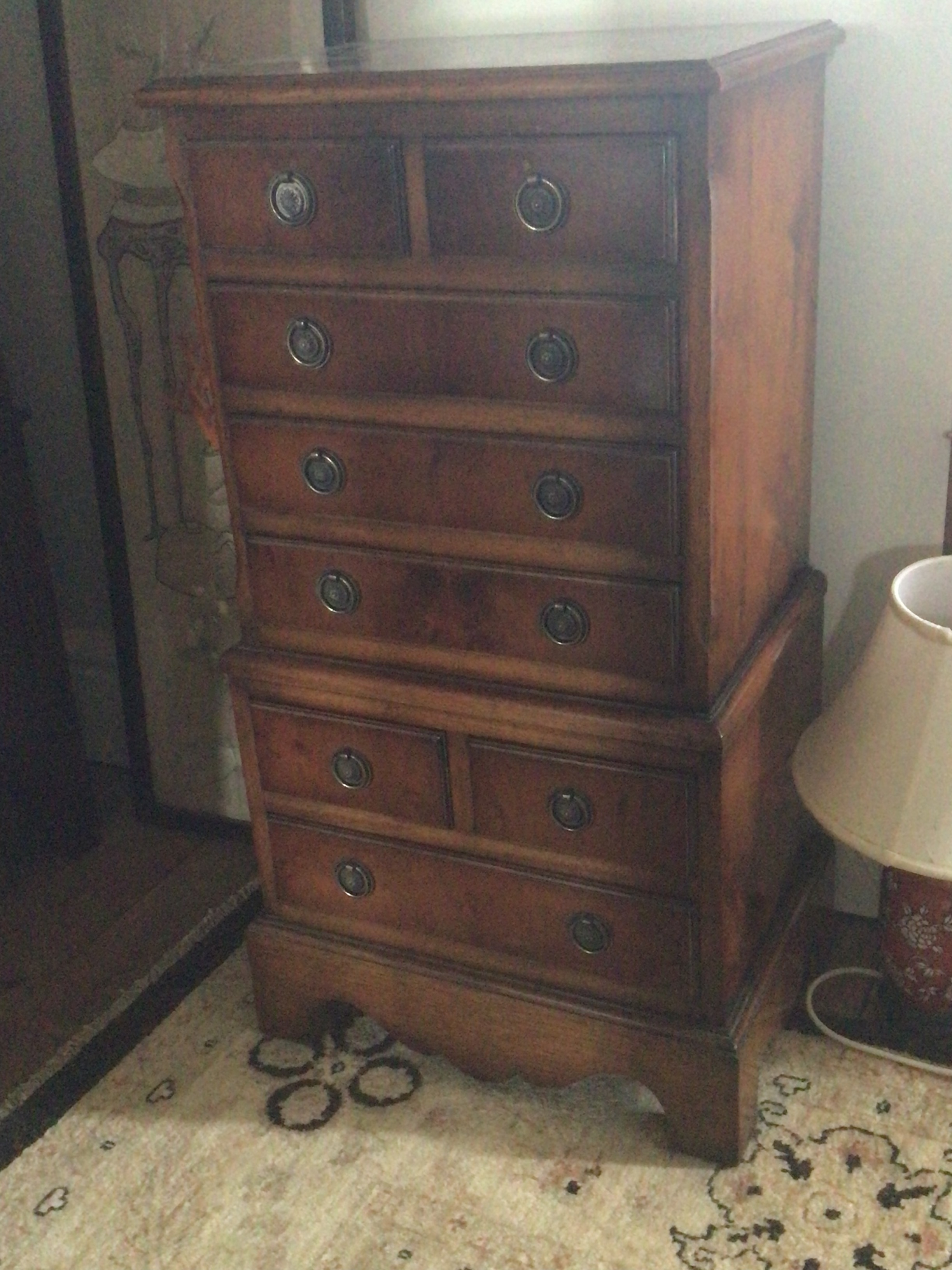 A modern small walnut flight of drawers with two tiers with short small drawers and long drawers 63cm high 