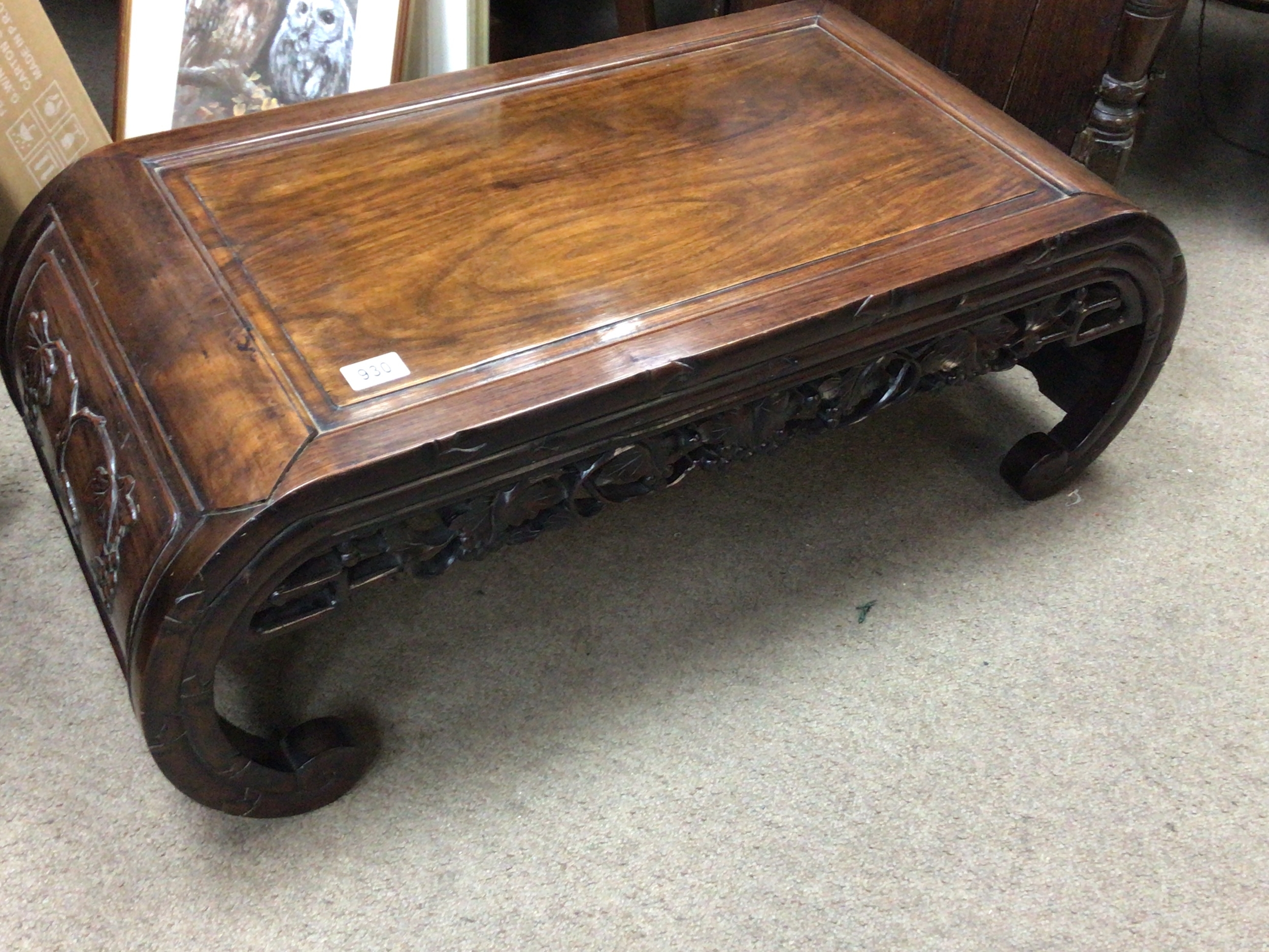  A Chinese hardwood early 20th century alter table with scroll ends and carved open fretwork.88x45cm