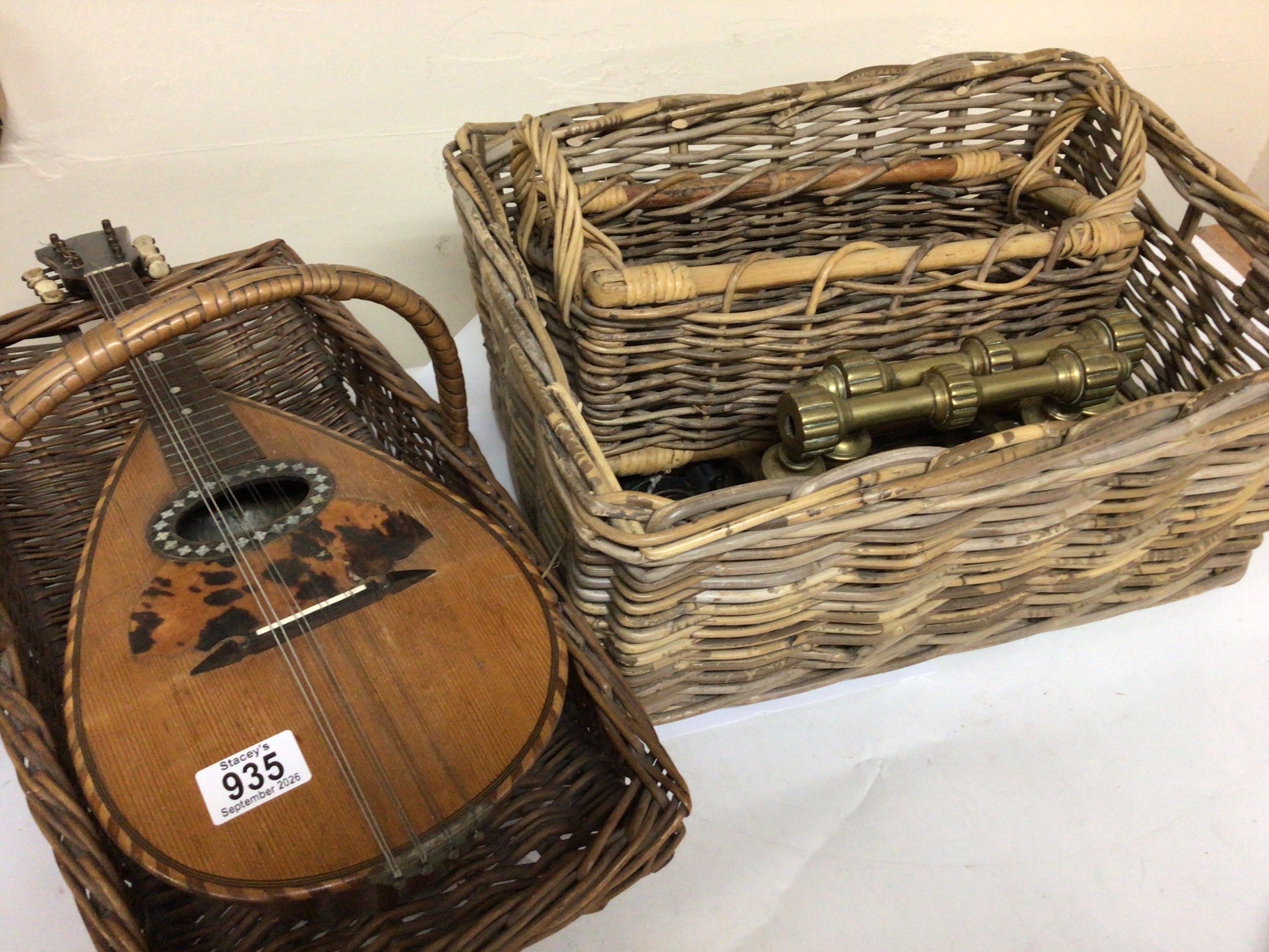 A Vintage Maltese Mandolin made by Carabott brothers and a quantity of vintage wicker baskets and a pair of brass fire iron rests. 