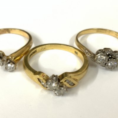 Three 18ct gold 2 stone diamond rings. Approx ring size J,N,O. Approx 9.1g. Postage category A