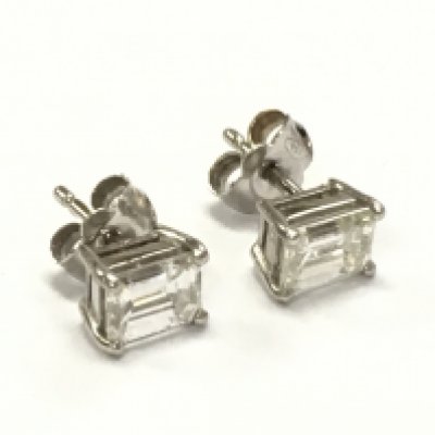 A pair of 18ct white gold emerald cut diamond earrings totalling 1.47 carat, with bag and receipt