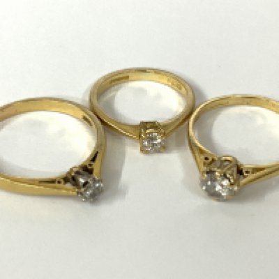 Three 18ct gold diamond solitaire rings. Approx ring size G, N, Q. Approx 7.2g. Postage category A