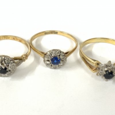 Three 18ct gold sapphire / diamond cluster rings. Approx ring size O,P. Approx 8.5g. Postage category A
