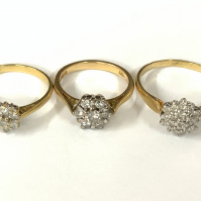 Three 18ct gold diamond cluster rings. Approx ring size K,N,U. Approx 9.7g. Postage category A