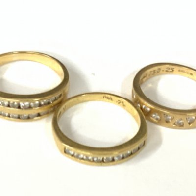 Three 18ct gold diamond half hoop rings. Approx ring size K,N. Approx 10.9g. Postage category A