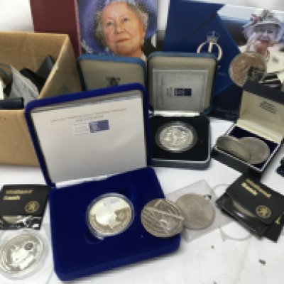 A collection of coins including Royal mint silver proof.