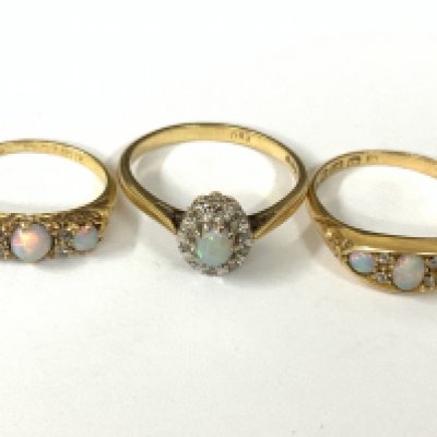 Three 18ct gold opal/diamond rings. Approx ring size K,Q. Approx 9.7g. Postage category A