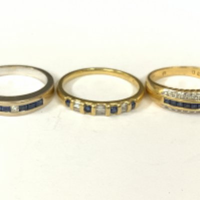 Three 18ct gold sapphire/diamond half hoop rings (x1 white gold). Approx ring size M,N,Q. Approx 11.8g. Postage category A