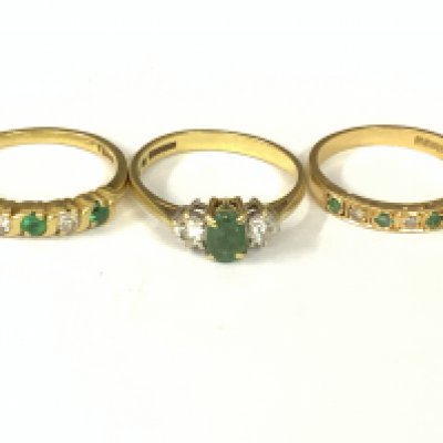 Three 18ct gold emerald / diamond rings. Approx ring size M,N,O. Approx 8.3g. Postage category A