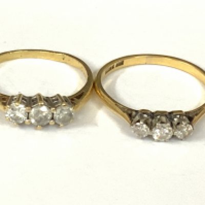 Two 18ct gold three stone diamond rings. Approx ring size N,O,P. Approx 4.6g. Postage category A