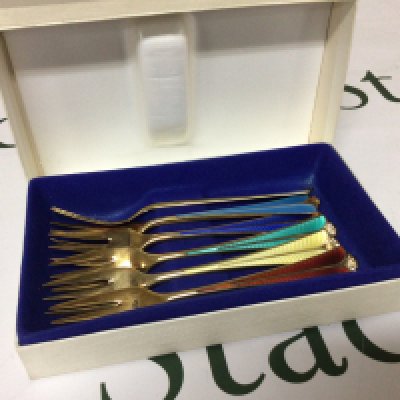 A cased set of six quality Silver gilt and enamel mid 20th century design folks each with different colours of enamel David Anderson Bergen Norway.