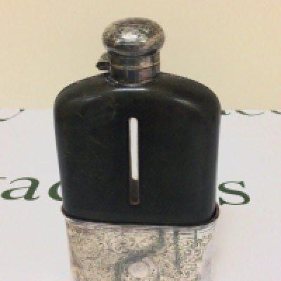 A late Victorian hip flask half pint size with a screw cap top detachable silver plated cup base leather lined bottle nice condition. Height 18cm