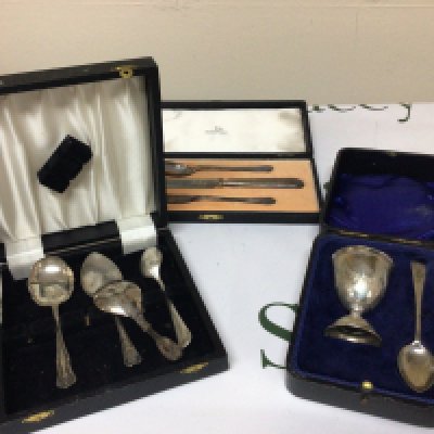 Cased silver egg cup and spoon a silver tea caddy spoon cased Walker Hall cutlery and other oddments