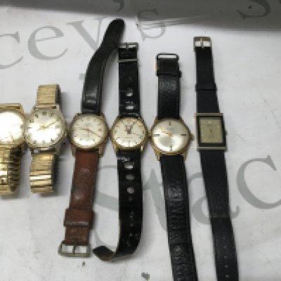 A collection of six vintage dress watches.