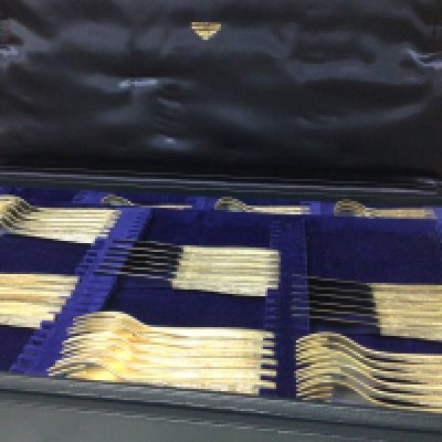 A Fine quality Silver Mid 20th Century design canteen of culture six place setting by Christopher Lawrence (b1936) Liveryman for the Worshipful Goldsmith Company Studied Central School of Arts & Crafts. All solid silver with a textured finish knifes with steel blades in a fitted two tier case Christopher Lawrence. Total cutlery weight 4.5kg approximately.