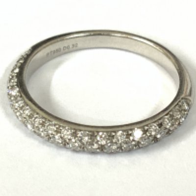 Platinum three quarter eternity ring set with RBC diamonds. Diamonds 0.32ct. Approx ring size I/J. Postage category A