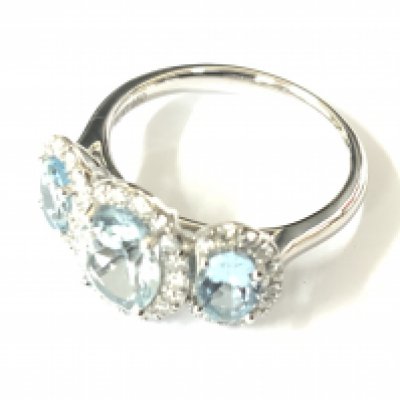 Platinum trilogy ring set with 3 oval aquamarines and RBC diamonds. Aquamarine 2.13ct. Diamonds 0.43ct. Approx ring size N. Postage category A