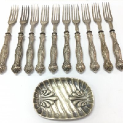 Ten hallmarked silver handled forks and a silver pin tray . Postage category b NO RESERVE