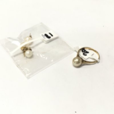 A 9ct gold pearl set of earrings and pearl solitaire ring.