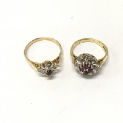 Two 18ct diamond and ruby cluster rings, size J,M1/2. Approx weight 6.4 grams.