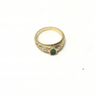 An 18ct gold emerald and diamond set ring. Size L, Approx weight 4.3grams.