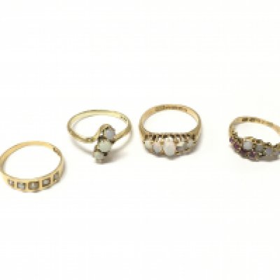 Three 18ct gold rings and one 15ct gold ring set with opals and pearls. Approx weight 10 grams, sizes I1/2,P,Q.
