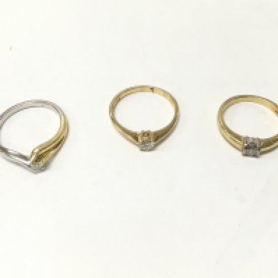 Three 18ct gold diamond solitaire rings, sizes K,M,N Approx weight 9.3 grams.