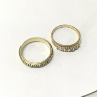 Two 14ct gold half diamond eternity rings. Approx weight 6.3 grams, size O.