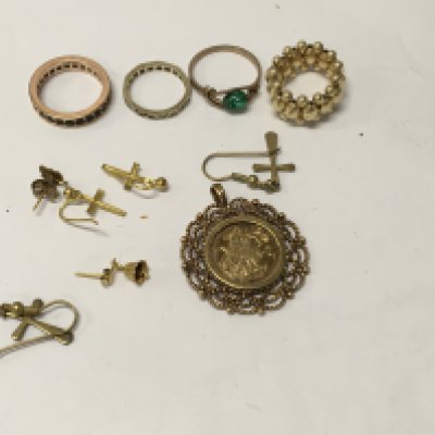 A 14 ct gold expanded ring together with three other rings earrings and pendant.