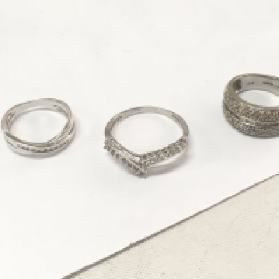 Three 9ct white gold diamond set bands. Size K,R. Approx weight 9.2 grams.