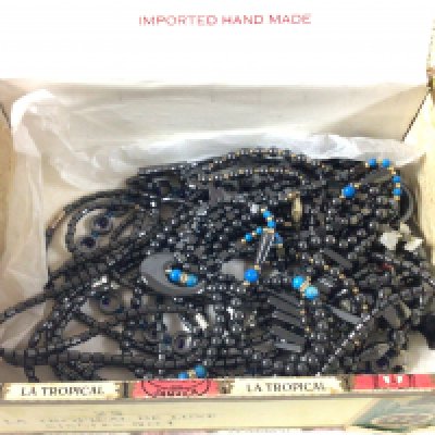 A large collection of hematite necklaces.