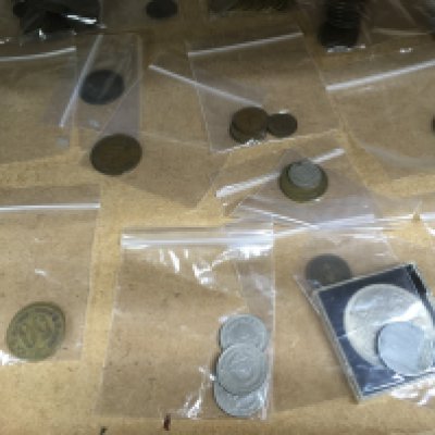A collection of coinage and bank notes .