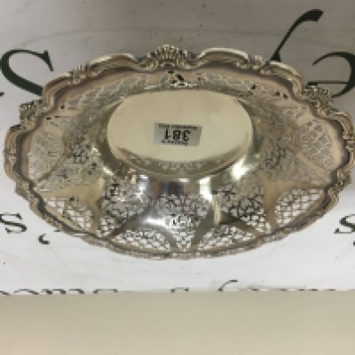 A German silver (800) round dish With pierced edges. Marks to the base. diameter 25cm weight 355g