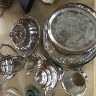 A collection of silver plated ware including Danish tea set and cutlery.