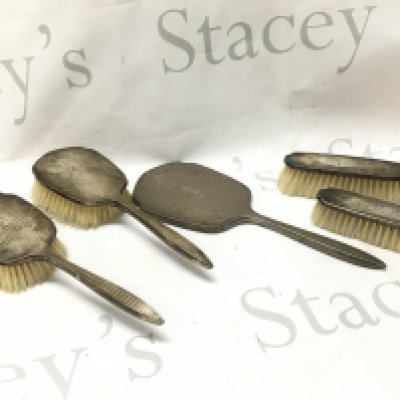 A silver hallmarked brush set , postage category B